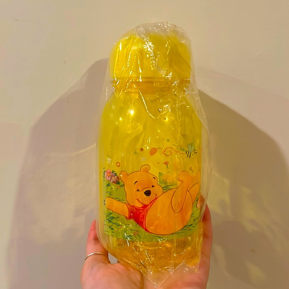 5 for/$25 Winnie the Pooh yellow plastic bottle